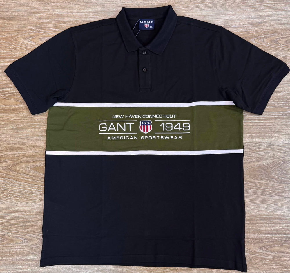 Navy polo with a contrasting chest panel