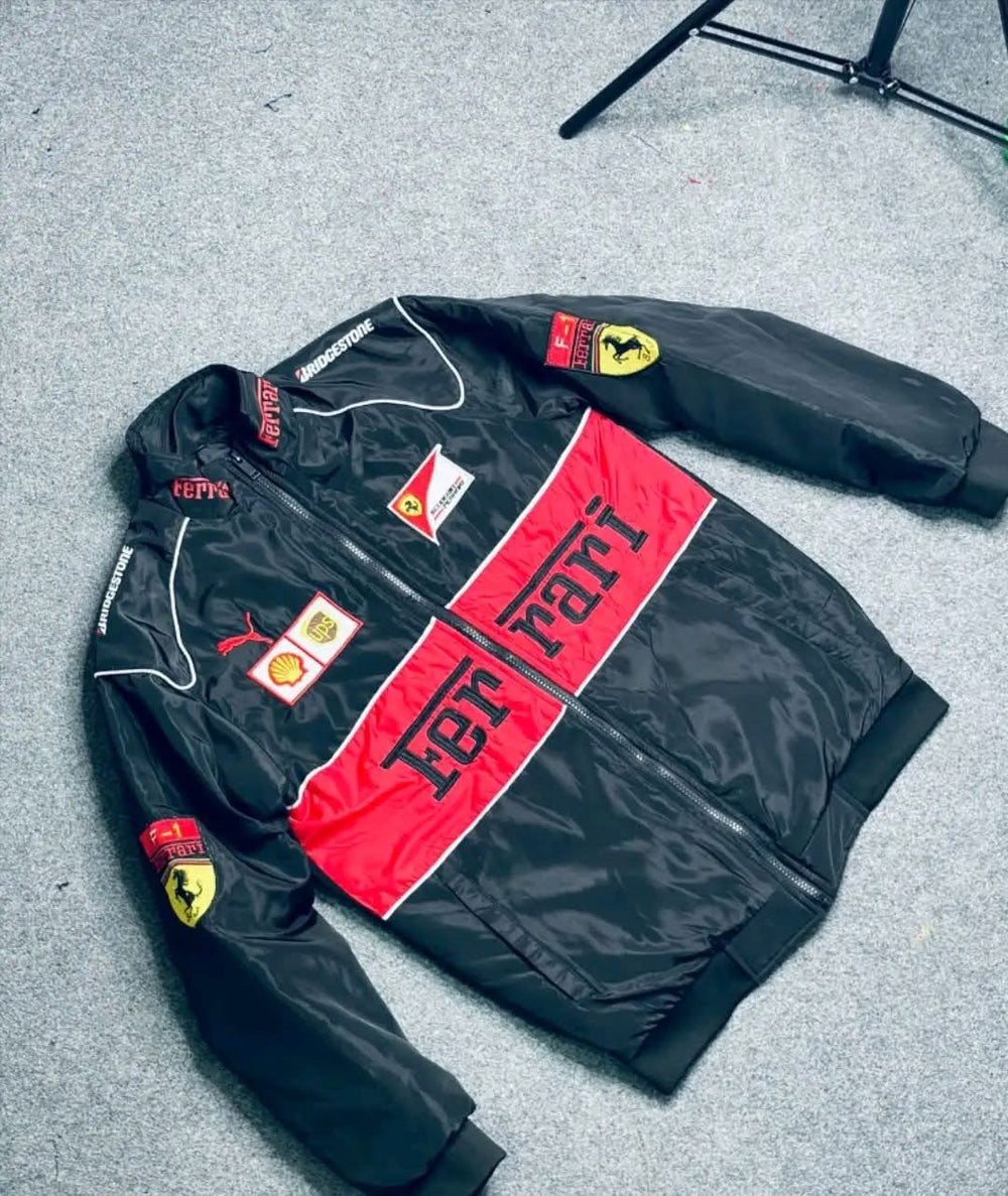 Black and red embroidered jacket laid flat